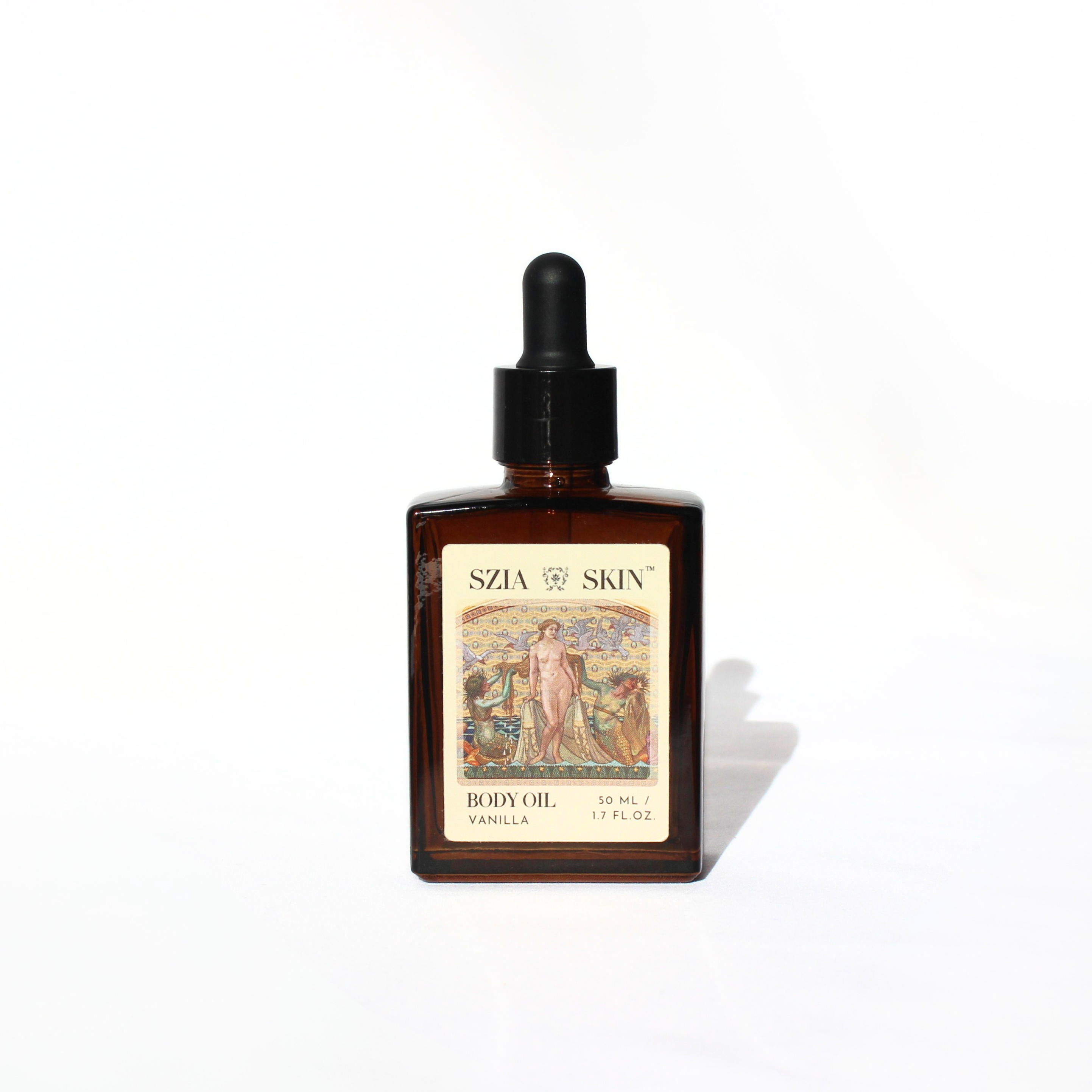 Bottle of Szia Skin body oil with a decorative label on a white background